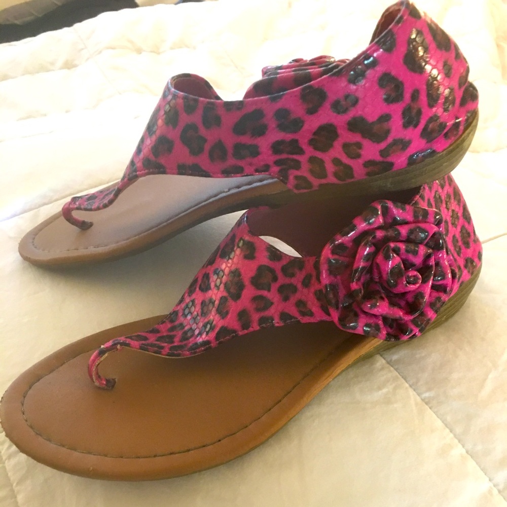 Pink Cheetah print sandals. Well loved but still in great shape! Velcro strap